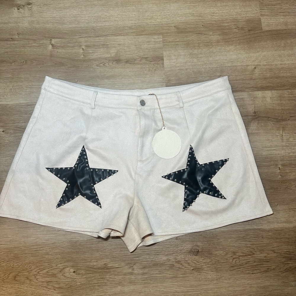 Stylish White Shorts with Black Star Accents